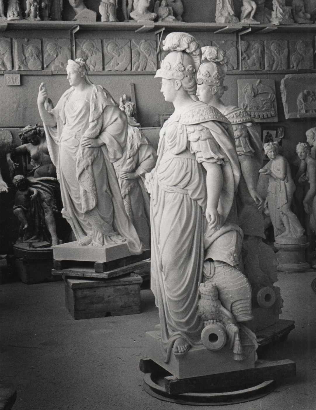Hand-carved ornamental drapery detail on a marble Athena figure, Studio Giannoni atelier