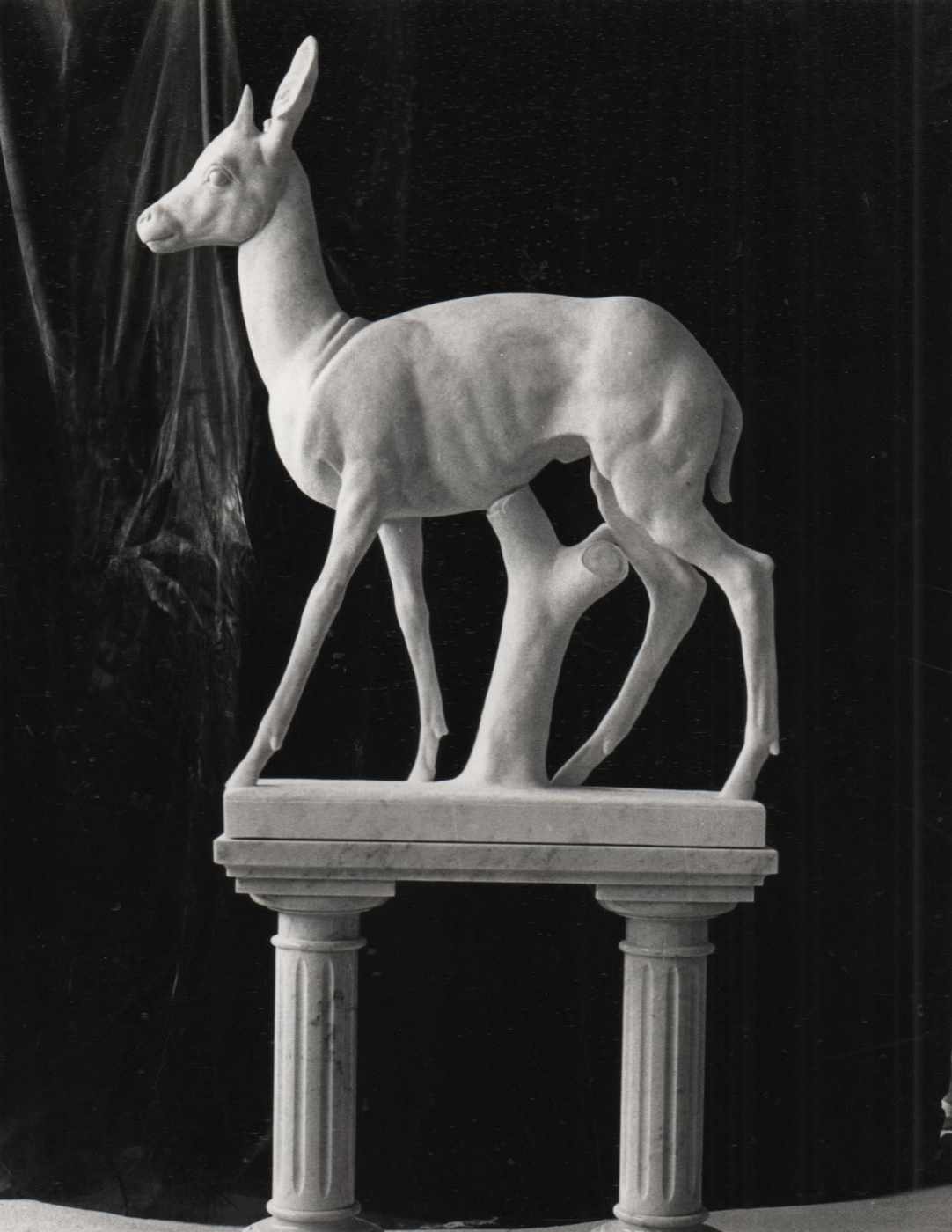 Hand-carved marble deer sculpture on fluted column pedestal, Studio Giannoni