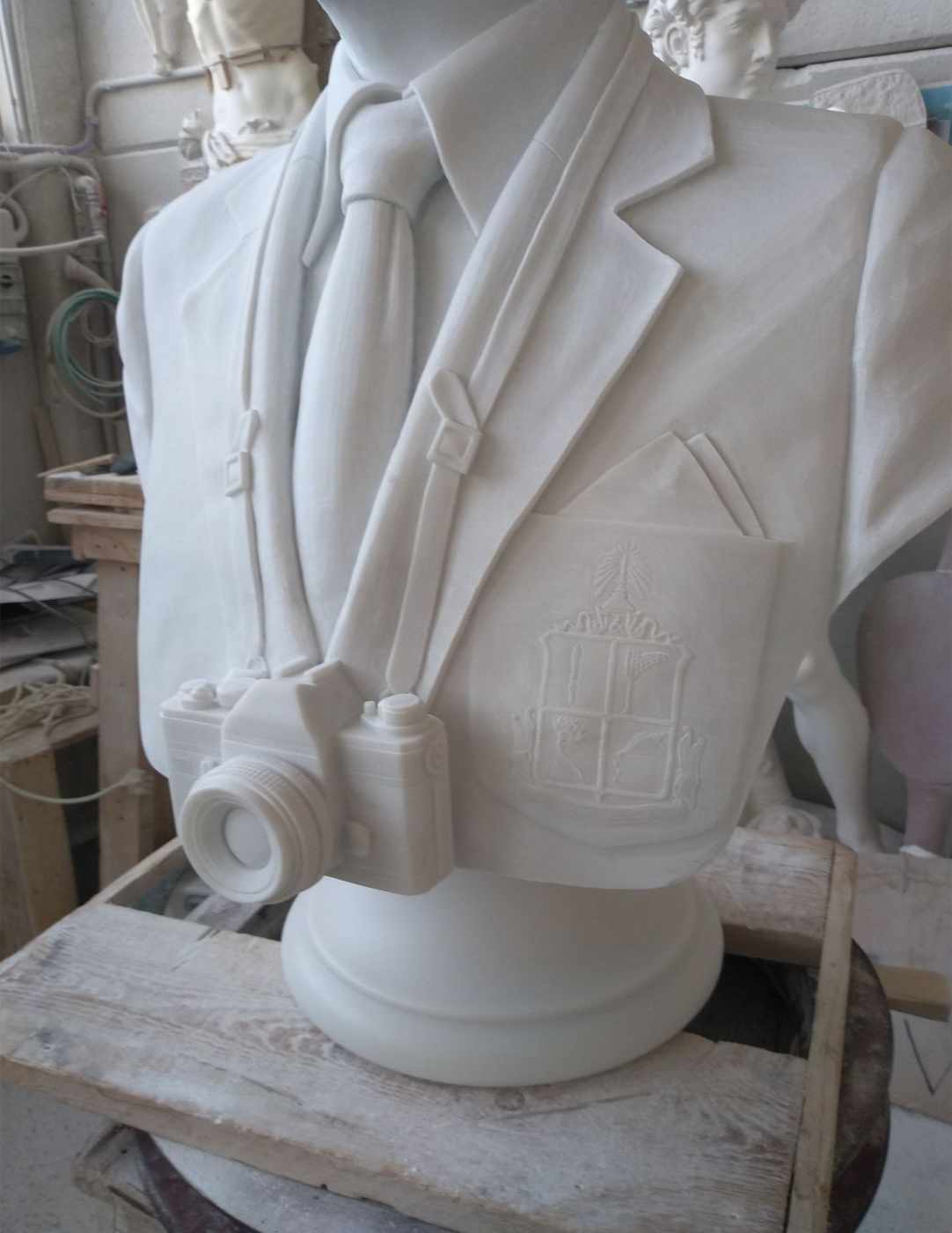 Hand-carved contemporary marble bust with camera and embroidered pocket detail, Studio Giannoni