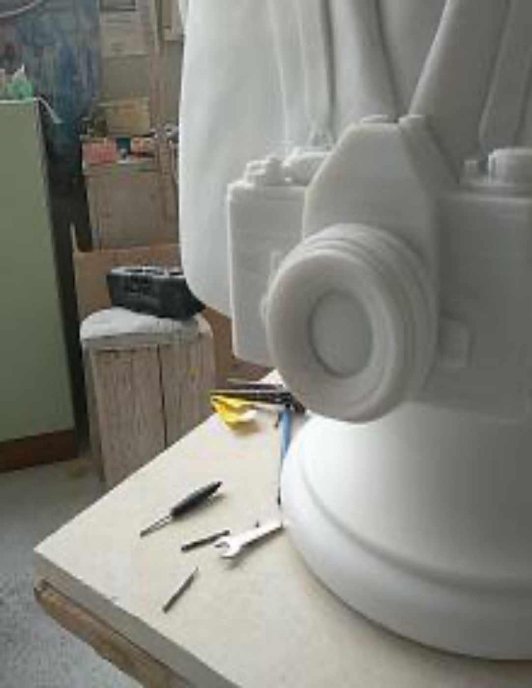 Hand-carved contemporary marble bust with camera and embroidered pocket detail, Studio Giannoni